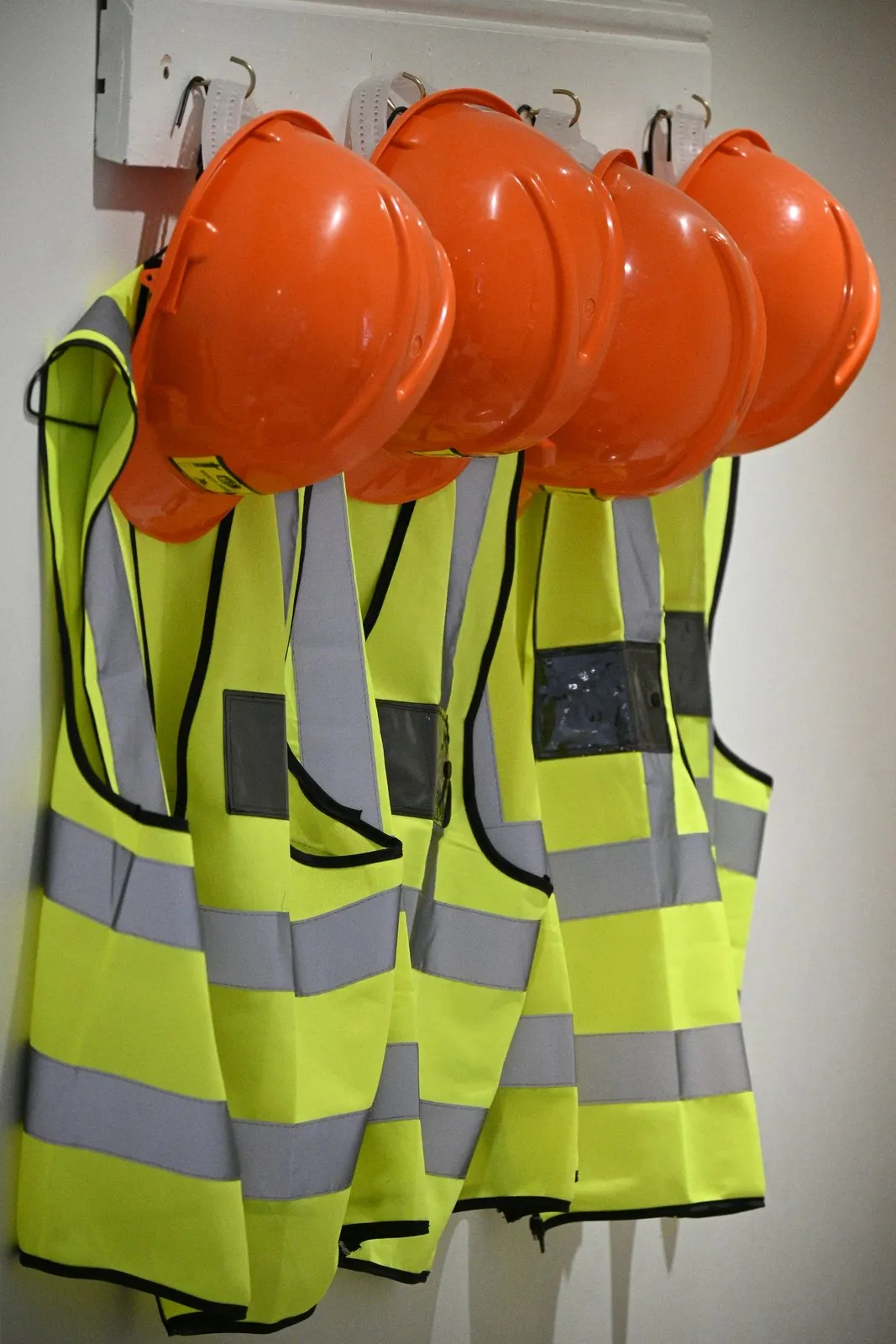 Hard hats and high-visibility safety vests